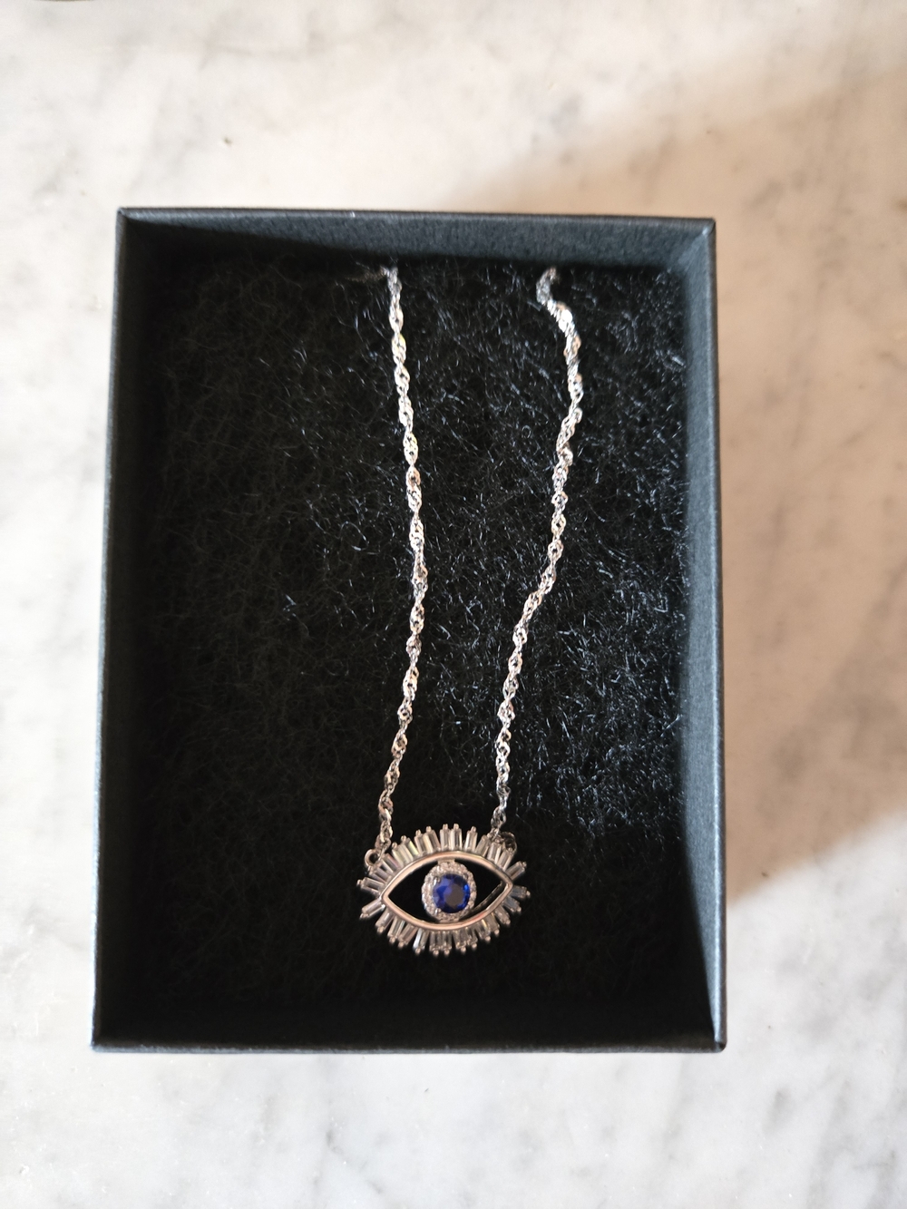 Silver Eye Pendant Necklace with Blue Center